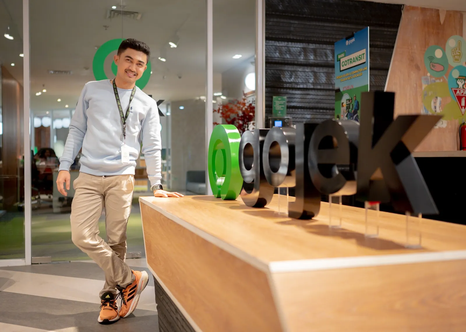 Terraced rice paddies stretching out to a lone power transmission tower